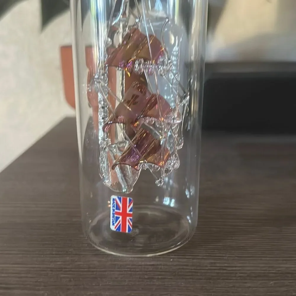 Glass boat inside a glass bottle Made in England
